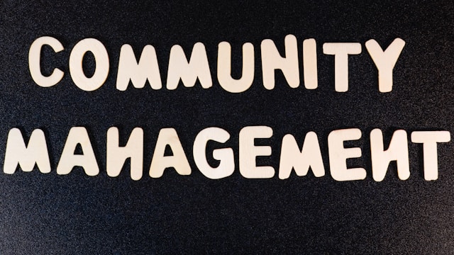 Image of a sign saying 'Community Management'